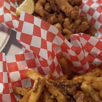 Angry Crab Shack - Fries tossed in trifecta sauce and calamari - Seafood Near Me - Mesa, Arizona