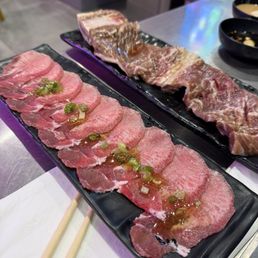 Beef tongue to the left and some sort of short rib on the right