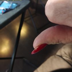 Sunny Nails - Shows where the Gel Polish is coming off on my right thumb nail.
