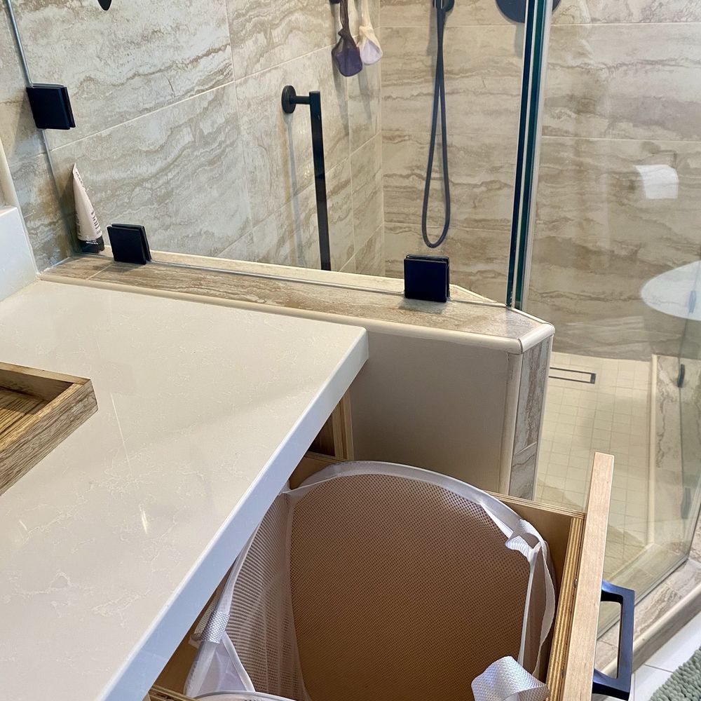 NextGen Home Builders - I asked for a place for laundry. I love this pull out hamper drawer. - General Contractors Near Me NextGen Home Builders - I asked for a place for laundry. I love this pull out hamper drawer. - General Contractors Near Me