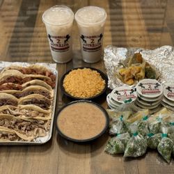 Taqueria 2 Potrillos - Family Taco Platter (15 tacos, rice, beans, tomatillo, guacatillo): Buche, Lengua (fave), Al pastor. Horchatas are a must!