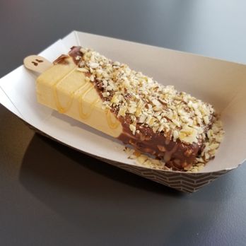 Monarca Gourmet Paletas - Dulce de leche with hazelnut dip, almonds, and caramel drizzle. Mmmmmm.... - Ice Cream & Frozen Yogurt Near Me - Clive, Iowa