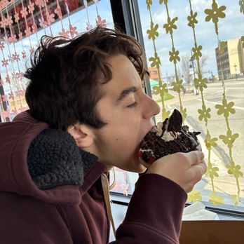 Marta's N More Bakery - Sebastian eating an Oreo donut pastry - Bakeries Near Me - Lorain, Ohio Marta's N More Bakery - Sebastian eating an Oreo donut pastry - Bakeries Near Me - Lorain, Ohio