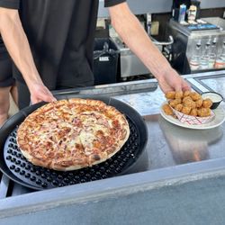 Avenue Ale House & Pizza Loft - pizza and tater tots