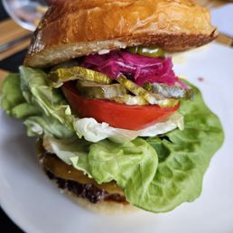 Cheeseburger, even though you can't see the very generous double patties. Cheeseburger, even though you can't see the very generous double patties.