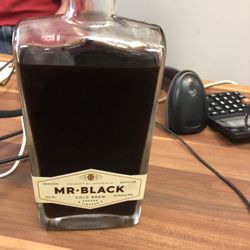 Mountain lakes wine And  liquor - Tequila mixed with me black=