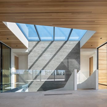LA Techs - An airy and open center space is illuminated by large windows in this client's home. - Home Theatre Installation Near Me - Van Nuys, California