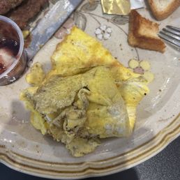 Singular lump of overcooked "scrambled" egg.