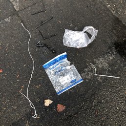 Garbage left in street from installation tech.