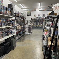 Great Escape Games - Lots of selection with figures, paints, board games, landscape, and books.