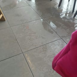 Sopping wet floor. In store and bathroom. My 4 year old slipped and fell. Zero caution signs, not raining outside either. Sopping wet floor. In store and bathroom. My 4 year old slipped and fell. Zero caution signs, not raining outside either.