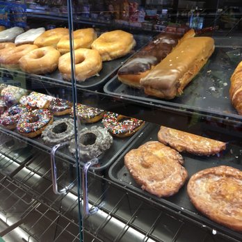 QuikTrip - a variety of doughnuts in a display case - Gas Stations Near Me - St Louis Downtown, Missouri QuikTrip - a variety of doughnuts in a display case - Gas Stations Near Me - St Louis Downtown, Missouri