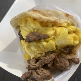 Gordita with steak and egg, it has beans, cheese and chunks of potato too!! I highly recommend that you try this one.
