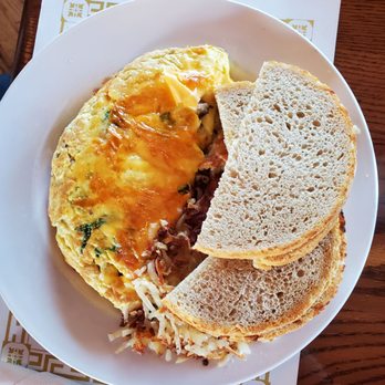 Maxim's at Oconomowoc Depot - Mushroom omelette with crispy hash browns and sour dough - American Near Me - Oconomowoc, Wisconsin Maxim's at Oconomowoc Depot - Mushroom omelette with crispy hash browns and sour dough - American Near Me - Oconomowoc, Wisconsin