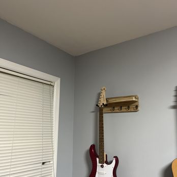 BB Pristine Painting - One bedroom, they painted nicely around the guitar wall mounts. - Painters Near Me BB Pristine Painting - One bedroom, they painted nicely around the guitar wall mounts. - Painters Near Me