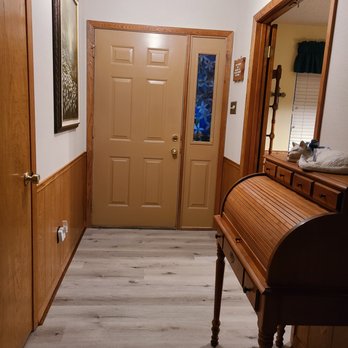 50Floor - a hallway with a piano and a mirror - Flooring Near Me - Hutto, Texas