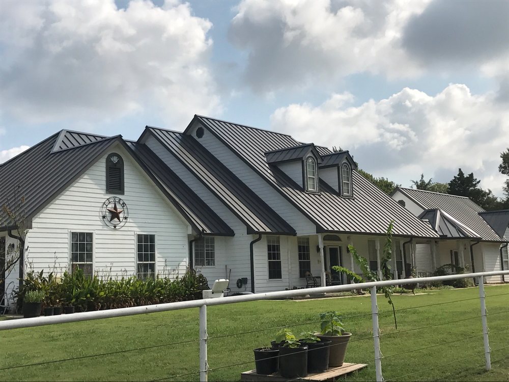 Slide of Swan Roofing