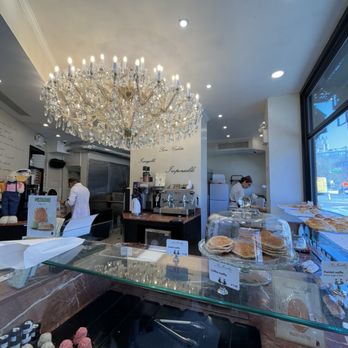 Aux Merveilleux De Fred - Shop interior & the chandellier - Desserts Near Me - New York, New York Aux Merveilleux De Fred - Shop interior & the chandellier - Desserts Near Me - New York, New York