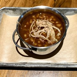 Palmyra Pub and Eatery - Tender, baked beans with shredded pork on top... Very sweet!