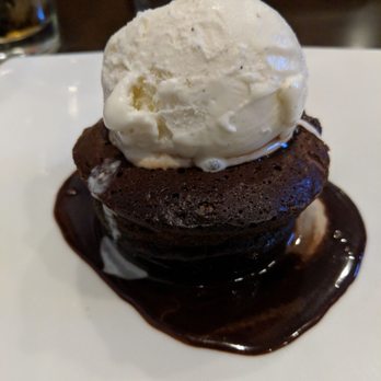 Persimmon Restaurant - chocolate molten cake with ice cream - New American Near Me - Bethesda, Maryland Persimmon Restaurant - chocolate molten cake with ice cream - New American Near Me - Bethesda, Maryland