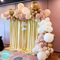 Balloon Song - Gold backdrop with balloon garland