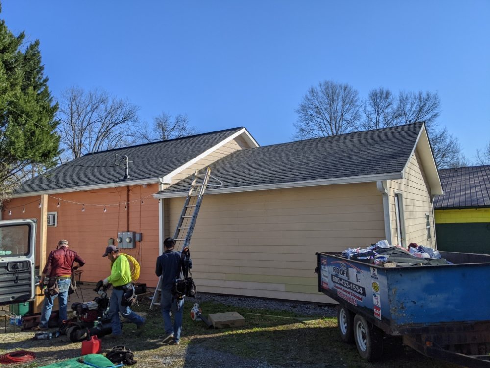 Slide of Ogle Roofing