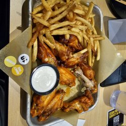 Buffalo Wild Wings - 12 traditional wings 1/2 medium 1/2 honey bbq
