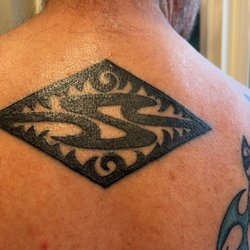 Retouched custom tattoo.