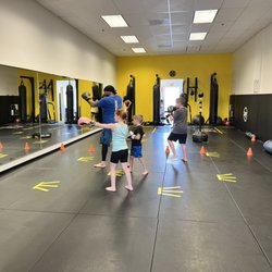 Hernandez Kickboxing Fitness - Kids first time trial class learning the basics.
