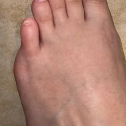 My painted toes. She even missed one of my toes.