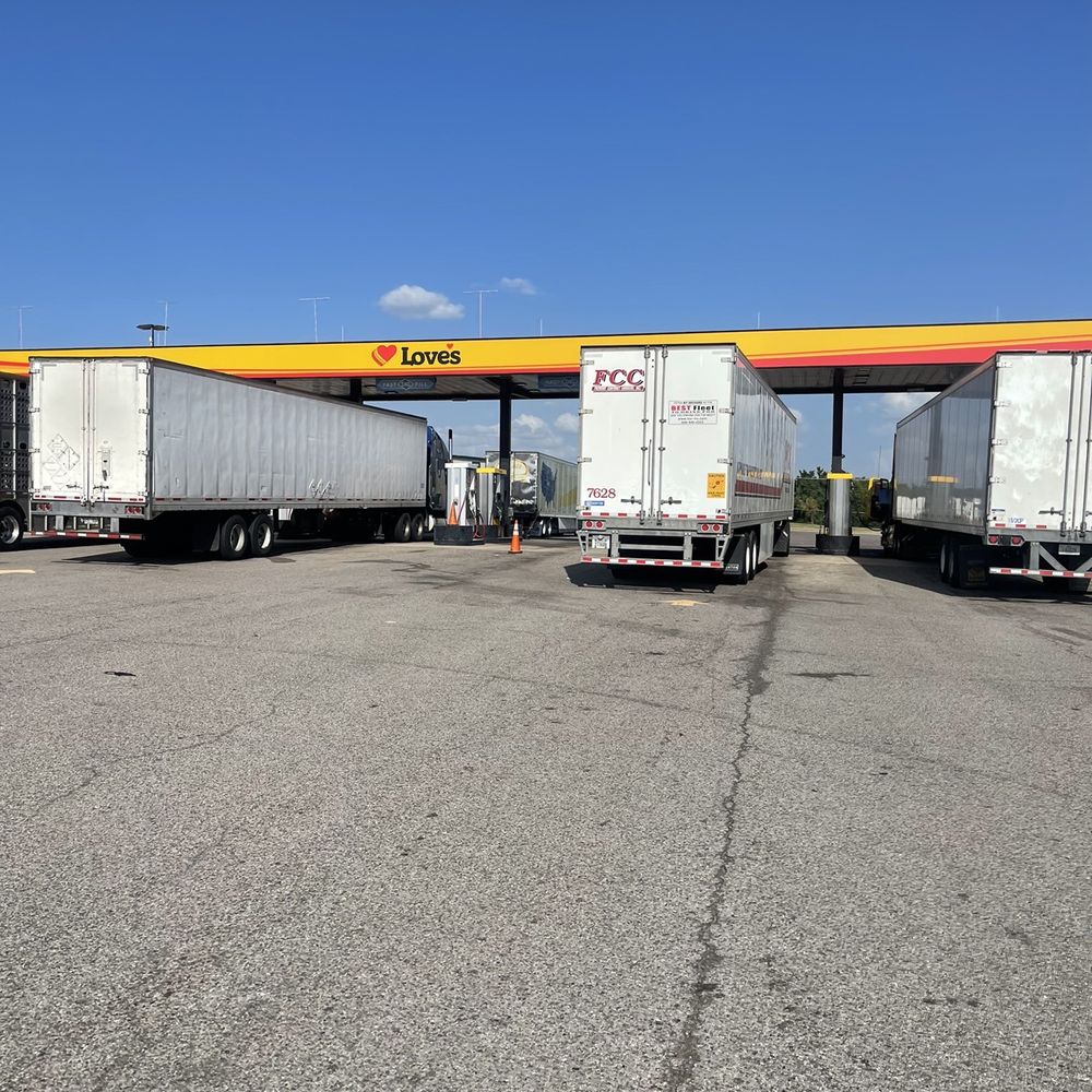 Love's Travel Stop - two semi trailers parked in a parking lot - Gas Stations Near Me - Guthrie, Oklahoma Love's Travel Stop - two semi trailers parked in a parking lot - Gas Stations Near Me - Guthrie, Oklahoma