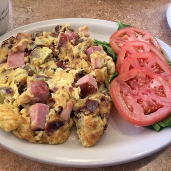 Steve's Cafe - Three Meat Scramble w tomatoes and spinach. Meats= ham, sausage and bacon. DELISH! - Cafes Near Me - Helena, Montana Steve's Cafe - Three Meat Scramble w tomatoes and spinach. Meats= ham, sausage and bacon. DELISH! - Cafes Near Me - Helena, Montana