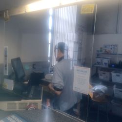 US Post Office - This clerk will make sure your package has a surcharge on it even if it's off by 0.1oz by moving it on the scale. This happens frequently.