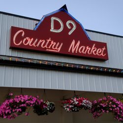 D9 Country Market - neon sign, outside, 2026