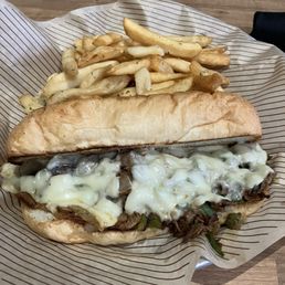 Philly Cheesesteak with fries lunch special. Toasted bun. Philly Cheesesteak with fries lunch special. Toasted bun.