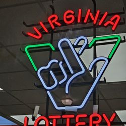 Go Mart - Sign that they sell Virginia Lottery here.