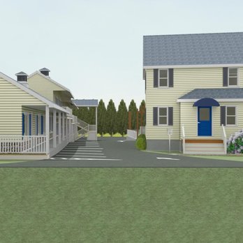 Footbridge Beach Motel & Cottages - Street view - Motel with new Rock being added to the front - Hotels Near Me - Ogunquit, Maine