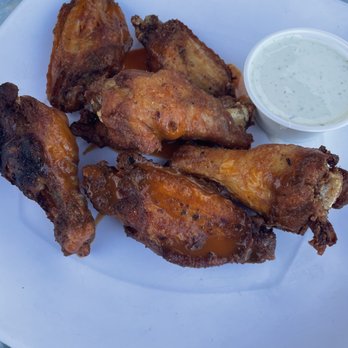 Sand On the Beach - Chicken wings with buffalo sauce. - American Near Me - Melbourne Beach, Florida Sand On the Beach - Chicken wings with buffalo sauce. - American Near Me - Melbourne Beach, Florida