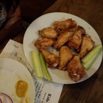 Coasters Taphouse - Chicken wings dry with  extra hot sauce on the side - Gastropubs Near Me - Cocoa Beach, Florida