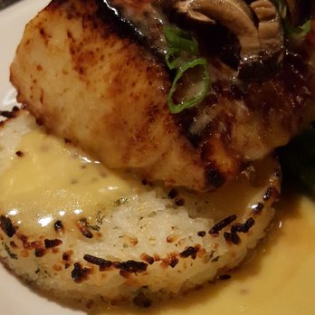 The Bay House - Black cod over sticky rice cake - Seafood Near Me - Naples, Florida The Bay House - Black cod over sticky rice cake - Seafood Near Me - Naples, Florida