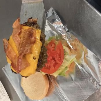 Roaming Meals - Our Juicy Classic American Cheeseburger   Our slogan created by our customers is  "You should've grabbed 2 of em." Delicious - Burgers Near Me - Cleveland, Ohio
