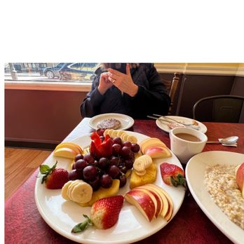 Lucile's Creole Cafe - Fruit planner, oats, sausage, coffee, beignet - Cafes Near Me - Erie, Colorado Lucile's Creole Cafe - Fruit planner, oats, sausage, coffee, beignet - Cafes Near Me - Erie, Colorado