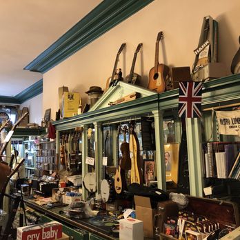 Guitar Bar - Endless row of guitars - Musical Instruments & Teachers Near Me - Hoboken, New Jersey
