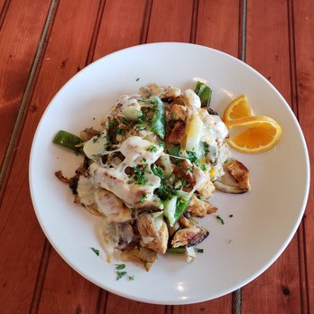 The Nook - a plate of food on a wooden table - Breakfast & Brunch Near Me - Milton, Delaware The Nook - a plate of food on a wooden table - Breakfast & Brunch Near Me - Milton, Delaware