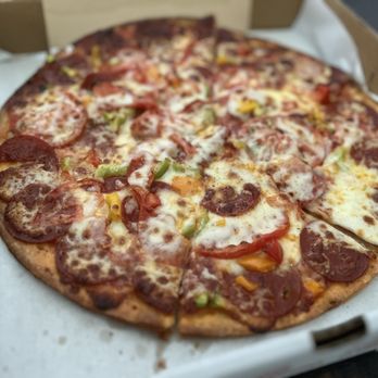 Trattoria Pizzeria - Pepperoni pizza, add tomatoes and peppers. - Italian Near Me - Hattiesburg, Mississippi Trattoria Pizzeria - Pepperoni pizza, add tomatoes and peppers. - Italian Near Me - Hattiesburg, Mississippi