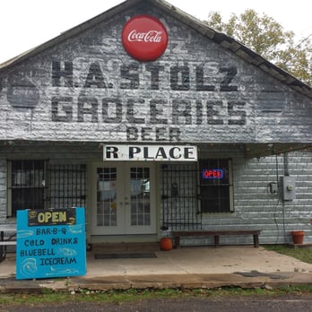 R Place - the front of a building with a coca cola sign - Desserts Near Me - Washington, Texas R Place - the front of a building with a coca cola sign - Desserts Near Me - Washington, Texas