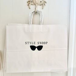 Style Snoop - This is their shopping bags. My gifts that I was returning were items still on the hangers still in store.