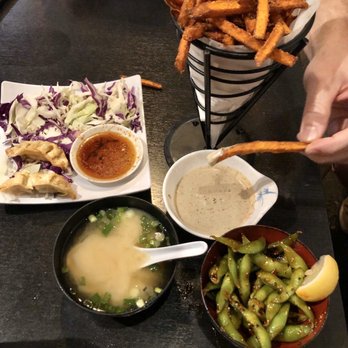 Akira Aptos - UH-mazing sweet potato fries with miso aioli dip, garlic edamame, gyoza, and miso soup - Sushi Bars Near Me - Aptos, California Akira Aptos - UH-mazing sweet potato fries with miso aioli dip, garlic edamame, gyoza, and miso soup - Sushi Bars Near Me - Aptos, California