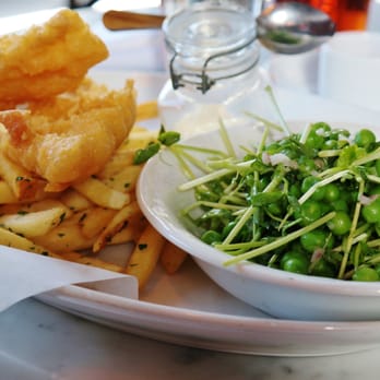 The Cavalier - Fish & Chips with a pea/pea-shoot salad.  Bomb! - New American Near Me - San Francisco, California