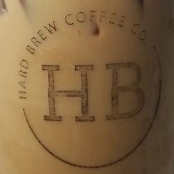 Hard Brew Coffee - Closeup view of cold beverage cup, with business' logo